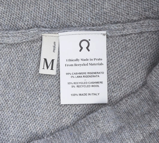 Raccolta Abiti Usati etichetta composizione Rifo Moda Circolare Made in Italy.webp