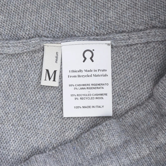 Raccolta Abiti Usati etichetta composizione Rifo Moda Circolare Made in Italy.webp