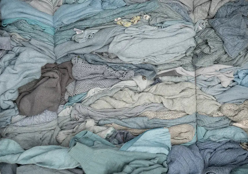 Raccolta Abiti Usati maglioni lana e cashmere Rifo Moda Circolare Made in Italy